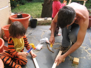 Tigger helping with hammering